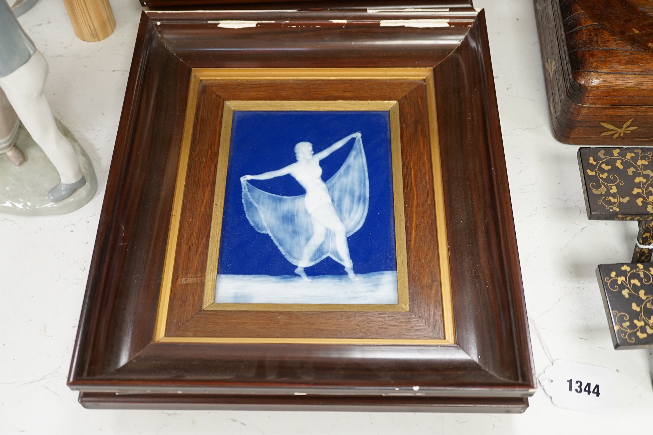 Two Limoges pâte-sur-pâte plaques, dancing female and female with a dog, each signed A. Barriere, framed, 20 x 14cm